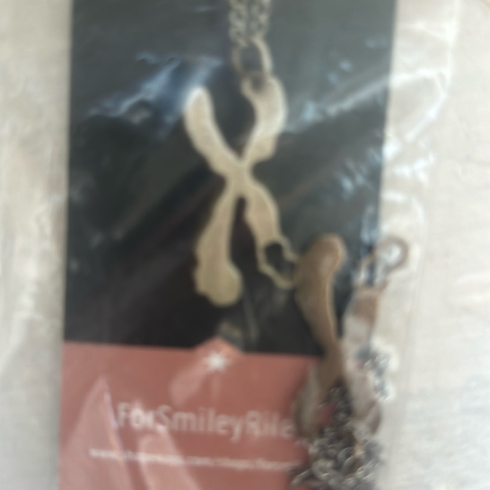 Charity necklace for Riley ex looking pendant necklace